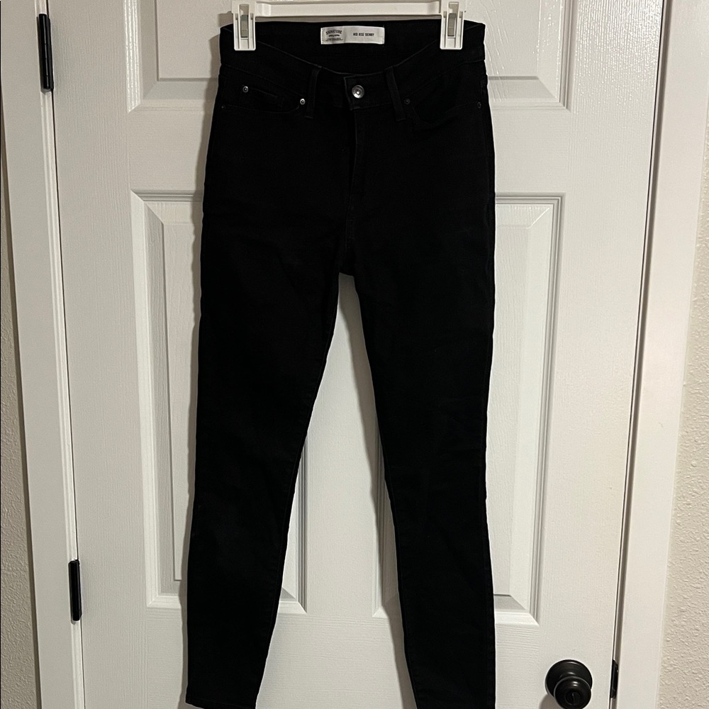 Women's Levi Mid Rise Black Skinny Jeans